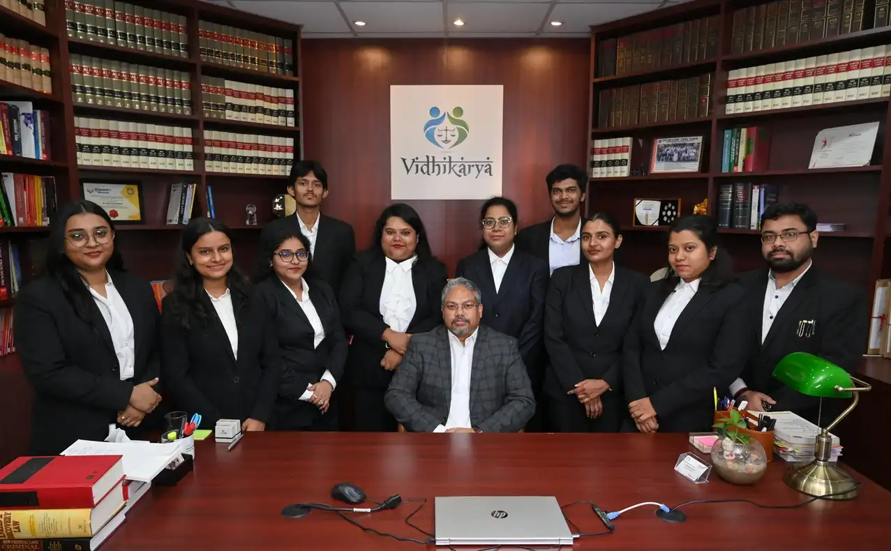  Vidhikarya law firm team in office, featuring Advocate Abhimanyu Shandilya, Co-Founder Suparna Moitra, and legal professionals